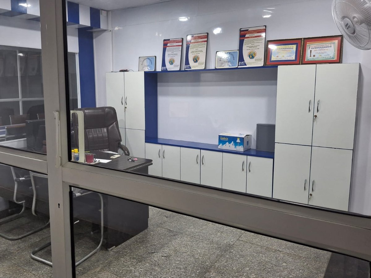A cabin, with the group's certifications on the wall